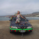 Illustration for article titled Groovalicious Purple Princess Of Peace Art Car Falls On Hard Times, Faces Crusher